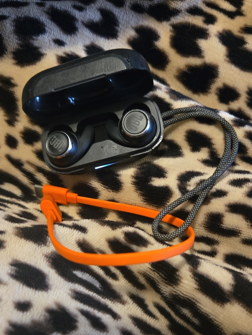 JBL True Wireless Earbuds with Orange Cable and Black Case